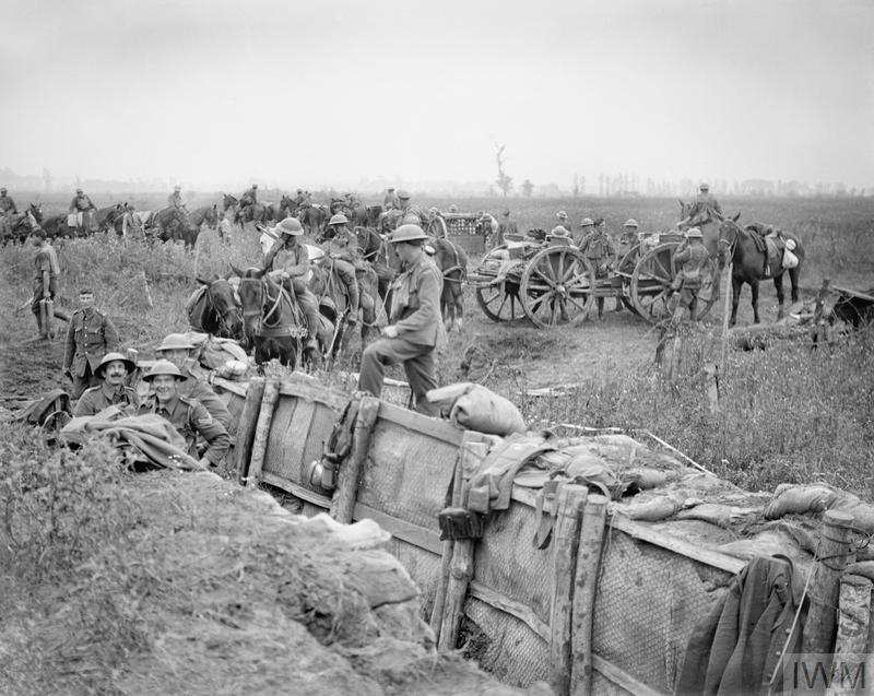 The Battle of Pilckem Ridge. An advanced British 18 pounder RFA gun battery taking up new positions close to a communication trench near Boesinghe, 31 July 1917. © IWM (Q 5723)
