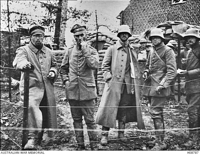 c. 1917. A German Army Commander with his adjutant and staff being held as prisoners of war at St Jean. This group were captured in a dugout during the battle at Broodseinde. The Commander is second from the left.