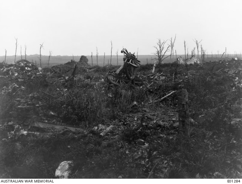 27th November 1917; A view of La Douve Farm looking north towards Messines, in Belgium. This farm was captured by the 39th Australian Battalion in the Battle of Messines on 7 June 1917. The brick wall on the right is all that remains of the farmhouse and the destroyed vehicles in the centre indicate the site of the farm buildings.