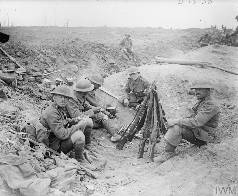 British Infantry in a support trench on a ground won in the battle, near Wytschaete, 12 June 1917. © IWM (Q 5484)